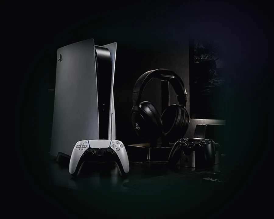 Consola PS5 con control DualSense y auriculares